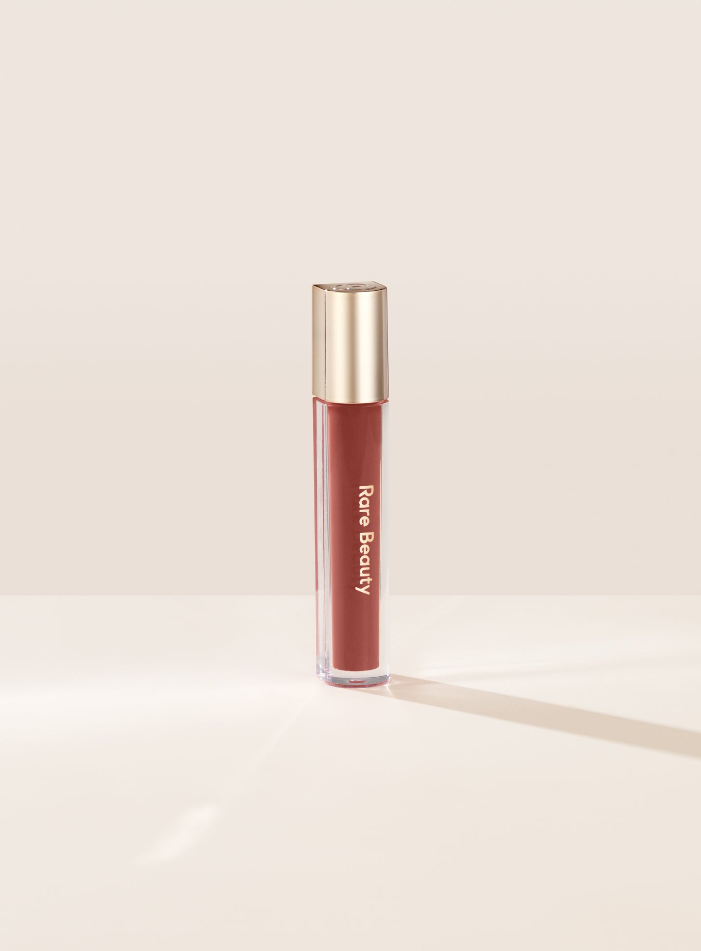 Stay Vulnerable Glossy Lip Balm - Rare Beauty / Bálsamo labial brillante hidratante
